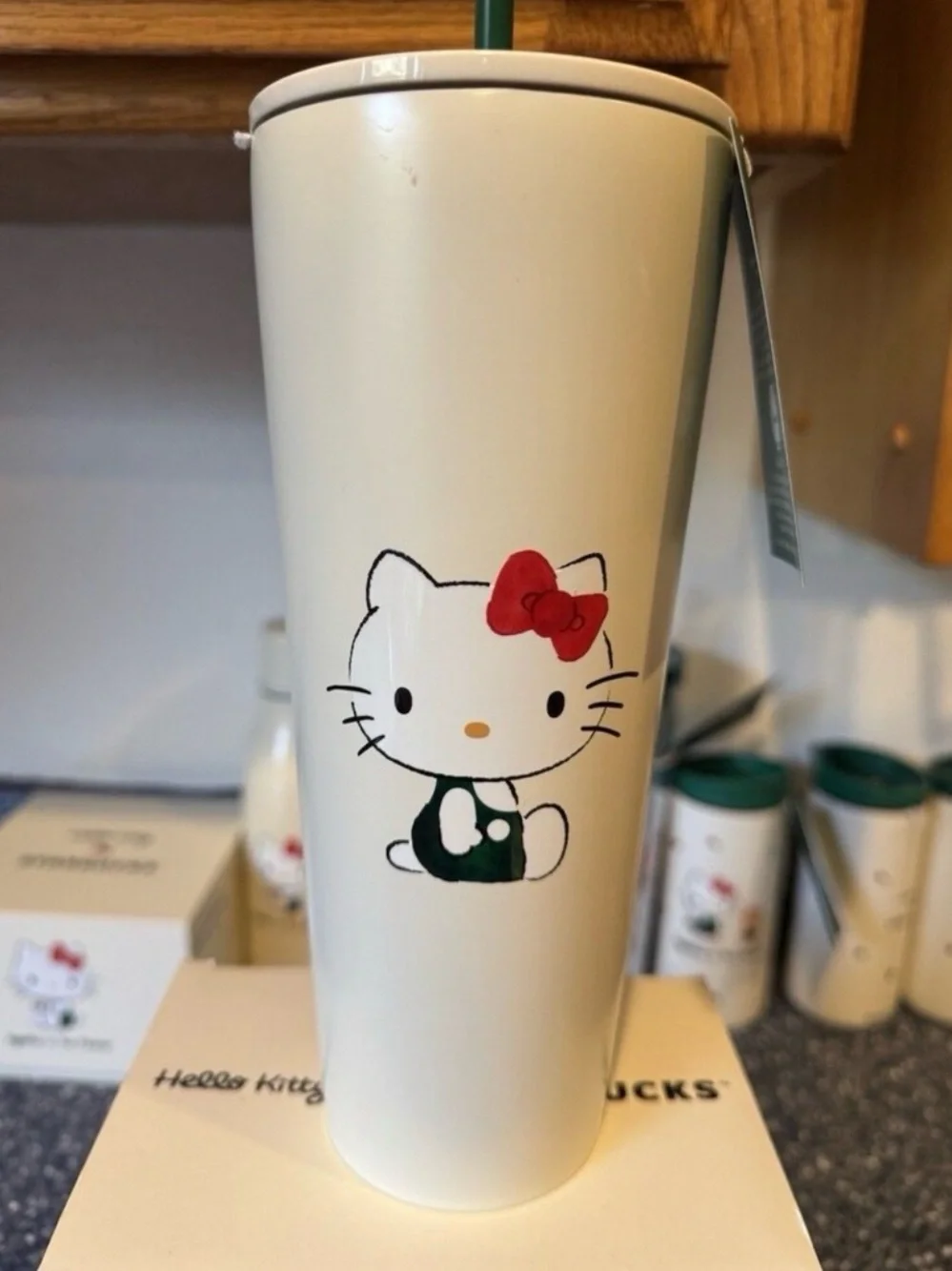 Starbucks Cream Tumbler with Green Tag and Red Bow Accent